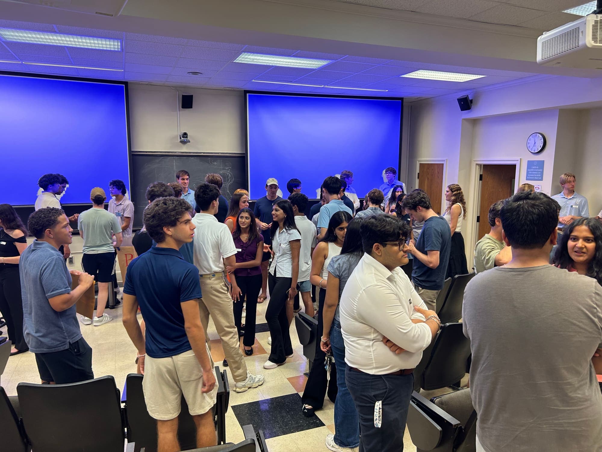 A full room at a Phi Chi Theta info session in Gardner 105